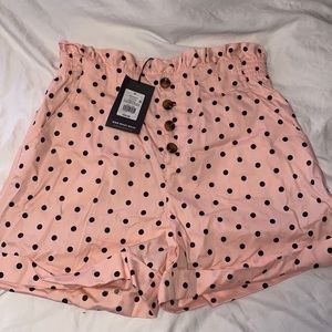 Black and pink polka dot shorts